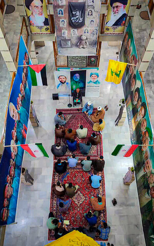 تصاویر/برگزاری مراسم شبی با شهدا در مدرسه علمیه آیت‌الله آخوند همدان