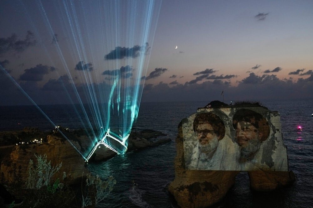 Resistance supporters lights Raouche Rock to honor Sayyed Nasrallah