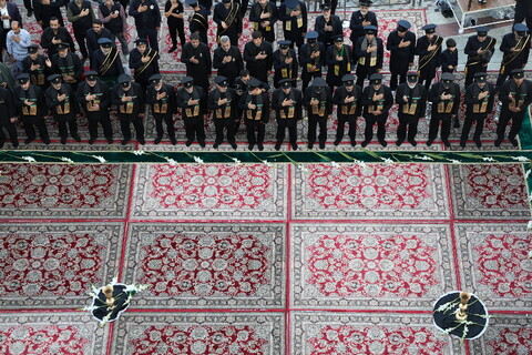 تصاویر/ آیین تعویض پرچم گنبد حرم حضرت فاطمه معصومه(س) در وفات شهادگونه ایشان