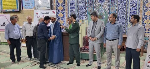 تصاویر/ تجلیل از پیشکسوتان جهاد و شهادت در نمازجمعه گاریرات و کهدوئیه