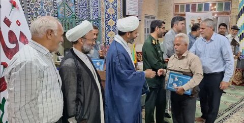 تصاویر/ تجلیل از پیشکسوتان جهاد و شهادت در نمازجمعه گاریرات و کهدوئیه