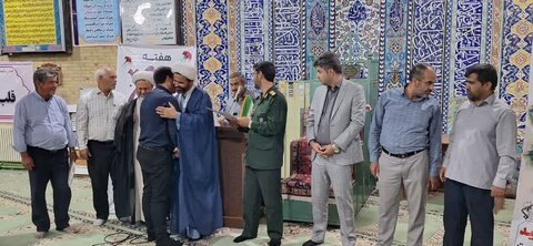 تصاویر/ تجلیل از پیشکسوتان جهاد و شهادت در نمازجمعه گاریرات و کهدوئیه