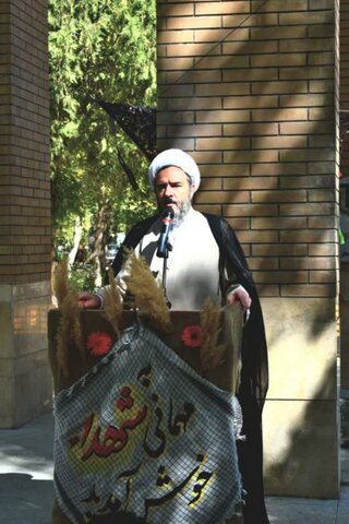 تصاویر/ گرامیداشت چهاردهمین سالگرد تدفین شهدای گمنام در شهرستان بیجار