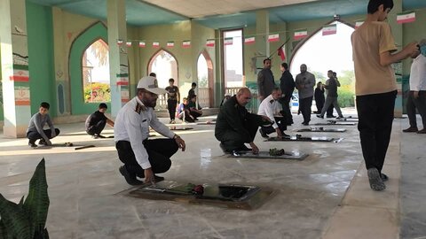 تصاویر/ مراسم غبارروبی قبور مطهر شهدا اهرم بمناسبت هفته تربیت بدنی و ورزش