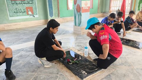 تصاویر/ مراسم غبارروبی قبور مطهر شهدا اهرم بمناسبت هفته تربیت بدنی و ورزش