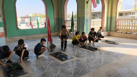 تصاویر/ مراسم غبارروبی قبور مطهر شهدا اهرم بمناسبت هفته تربیت بدنی و ورزش