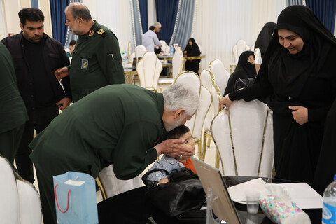 تصاویر / تجلیل از خانواده‌های شهدای جنگ تحمیلی 12 روزه در همدان