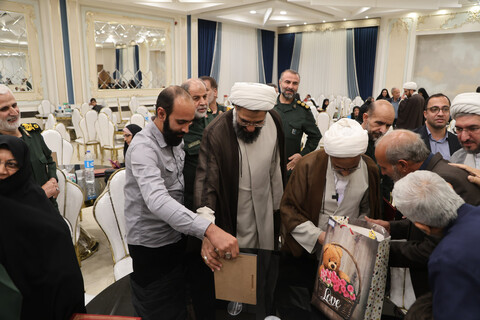 تصاویر / تجلیل از خانواده‌های شهدای جنگ تحمیلی 12 روزه در همدان