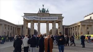 Massive Pro-Palestinian Banner Hung from Brandenburg Gate in Berlin Protest