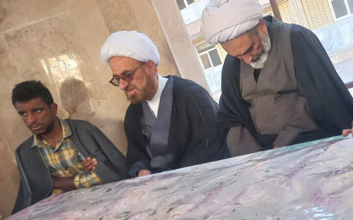 حوزه/ تصاویر میزبانی کارکنان مدرسه علمیه الغدیر نراق از شهید گمنام