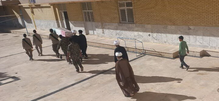 حوزه/ تصاویر میزبانی کارکنان مدرسه علمیه الغدیر نراق از شهید گمنام