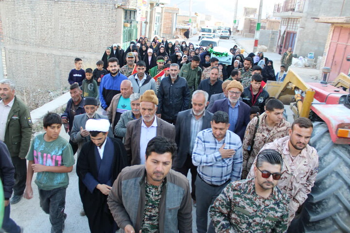 تصاویر/مراسم استقبال از پیکر مطهر شهید گمنام در روستای طلوبین  شهرستان میامی