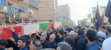 تصاویر/ تشییع پیکر پاک هشت شهید گمنام دوران دفاع مقدس در اهواز 