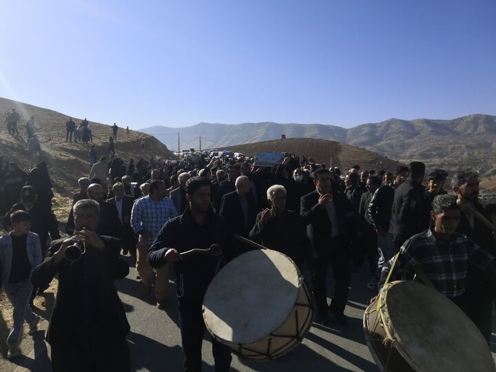 تصاویر/تشییع پیکر شهید گمنام در روستای تخم بلوط شهرستان هلیلان