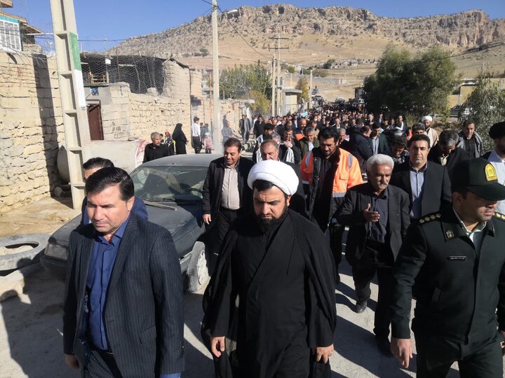 تصاویر/تشییع پیکر شهید گمنام در روستای تخم بلوط شهرستان هلیلان