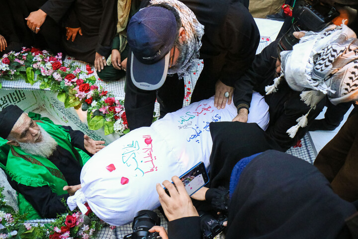 تصاویر/ تدفین شهید گمنام در مدسه علمیه آمنه