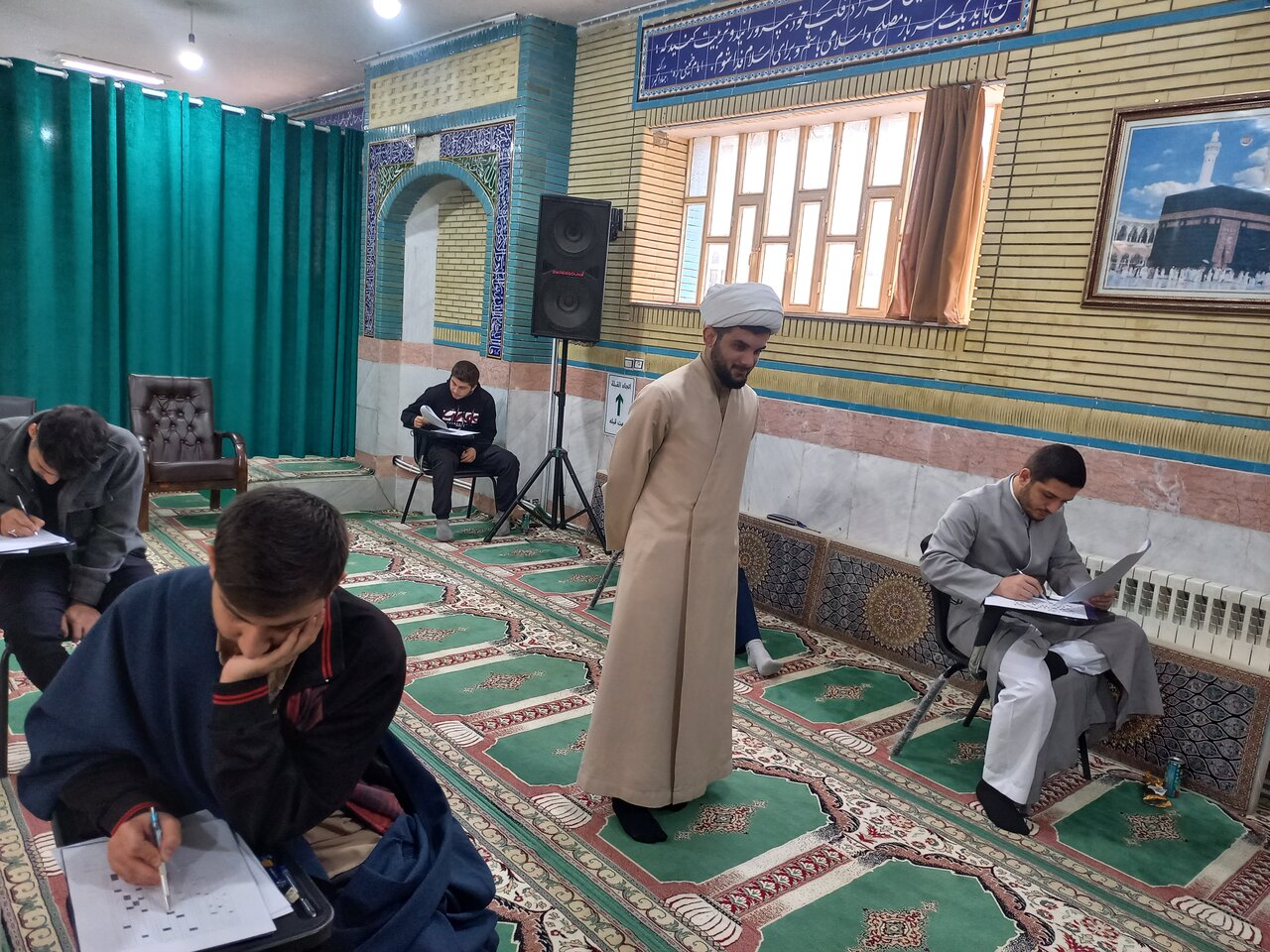 تصاویر/ آزمون کتبی دوره سیزدهم استعدادهای برتر حوزه های علمیه در ایلام