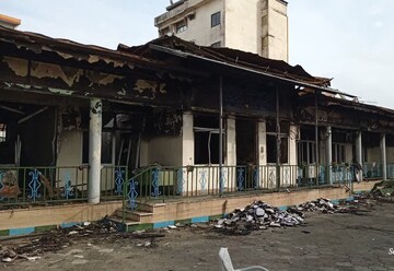 تصاویر/ برگزاری مراسم عزاداری در مدرسه علمیه به آتش کشیده شده بندر انزلی