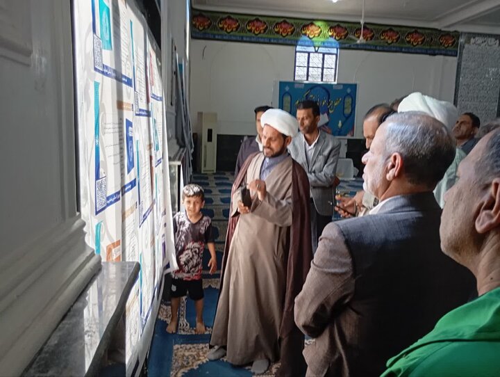 تصاویر/ بازدید مسئولان شهرستان نرماشیر از نمایشگاه «زندگی با آیه‌ها»