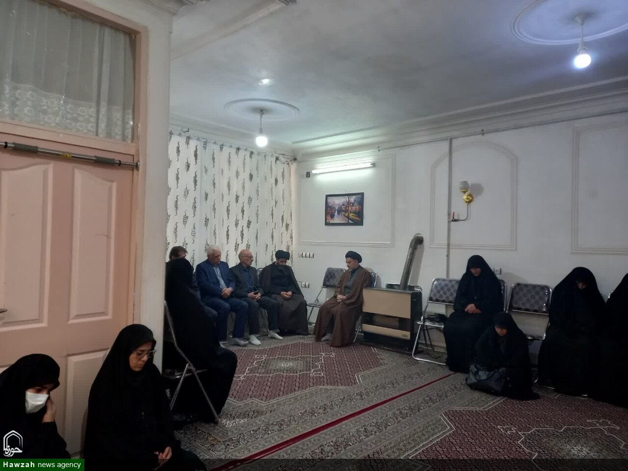 دیدار مدیر و اساتید حوزه علمیه خواهران لرستان با خانواده‌های شهیدان حسینی و بازگیر  