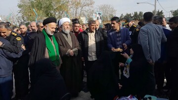 تصاویر/ تجدید میثاق امام جمعه آران وبیدگل با شهدا در سال جدید