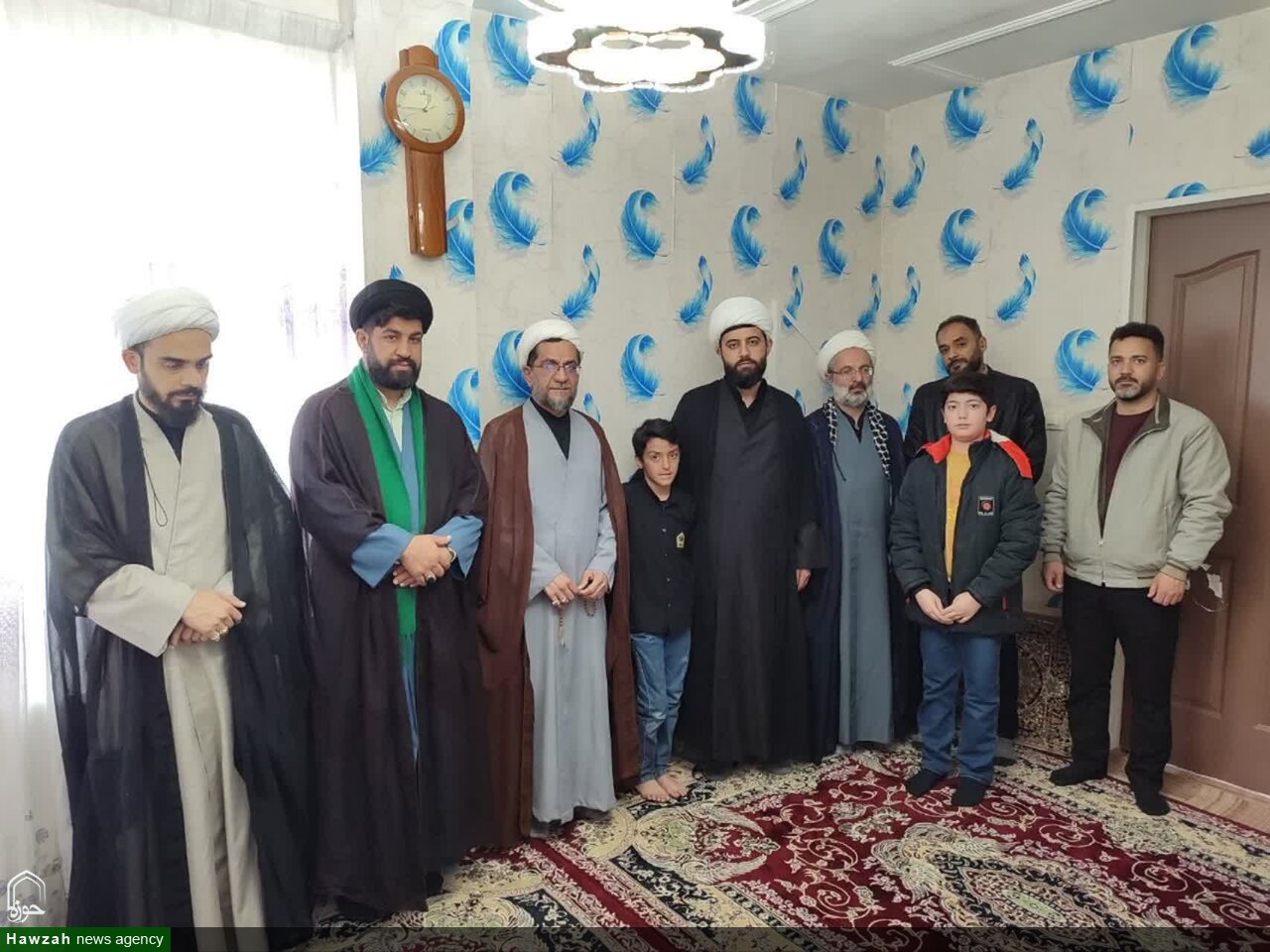 تجلیل اساتید و طلاب حوزه علمیه همدان از خانواده شهید جنگ رمضان+تصاویر