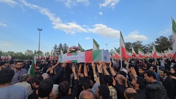 فیلم | تشییع پیکر مطهر پاسدار شهید سید علـیرضا شــــکاری پور در نیاسر