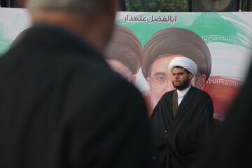 تصاویر/ استقبال از روحانی بازمانده ناوشکن دنا در میدان کشتی شهرستان جویبار