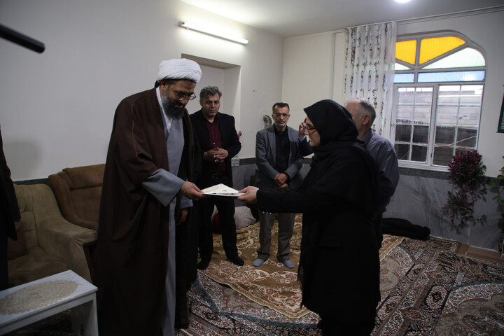 تصاویر / تجلیل نماینده ولی فقیه در استان همدان از شهدای تویسرکانی جنگ رمضان