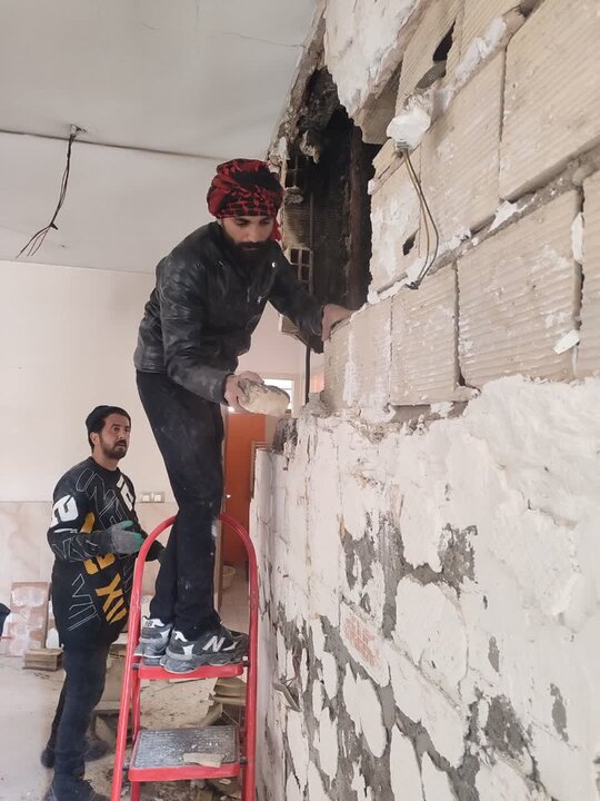 تصاویر/ تداوم فعالیت گروه جهادی شهید حججی کاشان در مناطق جنگ‌زده تهران