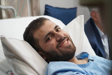 تصاویر/ عیادت رییس بنیاد شهید از جانباز حسین محمدی