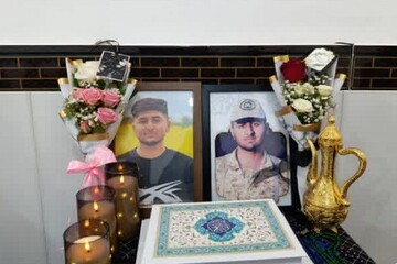 تجلیل مدیر مدرسه علمیه الزهرا(س) گیلان‌غرب، از خانواده شهید خسروی+عکس