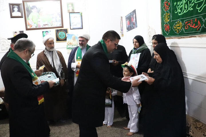 تصاویر/ دیدار خادمان رضوی با خانواده شهید اسماعیل شجاع تنگستانی