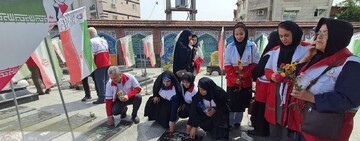 تصاویر/ غبارروبی مزار شهدای آمل در «روز هلال احمر»