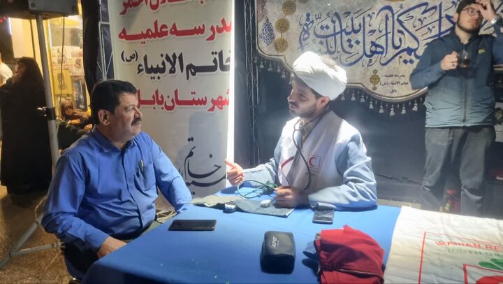 تصاویر/ خدمت رسانی طلاب مدرسه علمیه خاتم الانبیاء (ص) بابل در تجمع مردمی