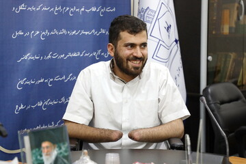 تکریم جانباز دهه هشتادی که دست‌ها و پاهایش را پای لانچر داد + عکس