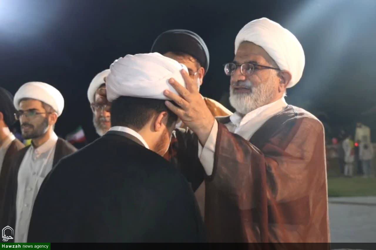 آیین تلبس دو طلبه کنگانی همزمان با عید غدیر برگزار شد
