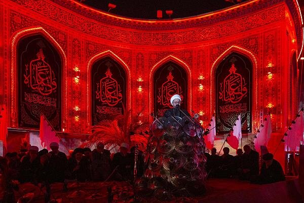 During the flag replacement ceremony, the Al-Abbas Holy Shrine holds a Hussaini mourning assembly