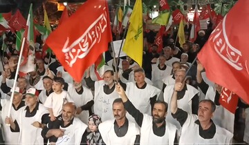 فیلم| کفن‌پوشی مردم انقلابی بهار در حمایت از پیام رهبر و شیعیان لبنان