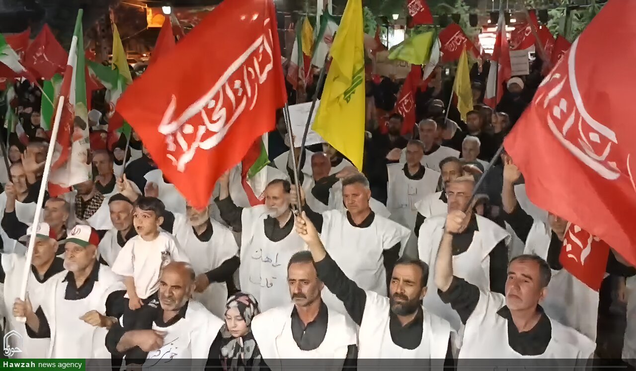 فیلم| کفن‌پوشی مردم انقلابی بهار در حمایت از پیام رهبر و شیعیان لبنان