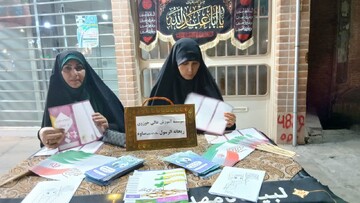 تصاویر/ برپایی میز فرهنگی «فرزندآوری و تعالی خانواده» در ساوه
