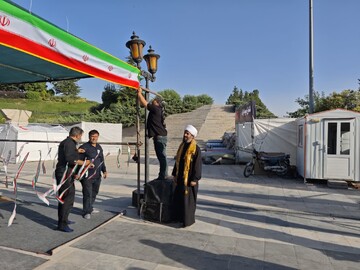 تصاویر/ فعالیت گروه جهادی امیرالمومنین(ع) کاشان برای میزبانی از زائران تشییع رهبر شهید در تهران