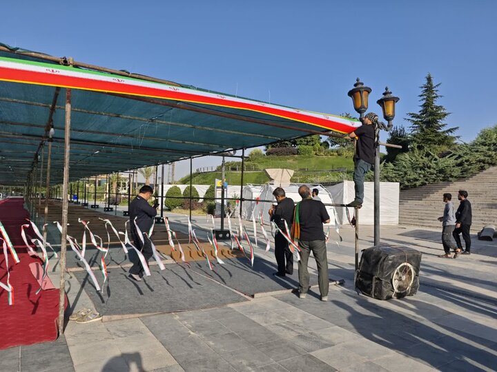 تصاویر/ فعالیت گروه جهادی امیرالمومنین(ع) کاشان برای میزبانی از زائران تشییع رهبر شهید در تهران