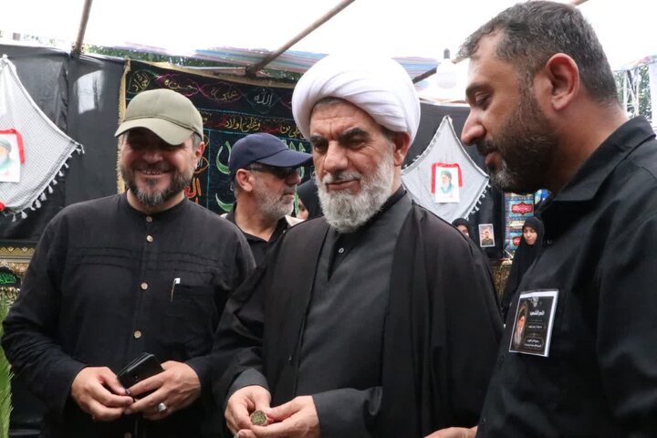 تصاویر / بازدید امام جمعه بویین زهرا از مواکب خدمت رسان به زائران مراسم تشییع رهبر شهید انقلاب اسلامی ایران -عکاس خانم جوشقانی