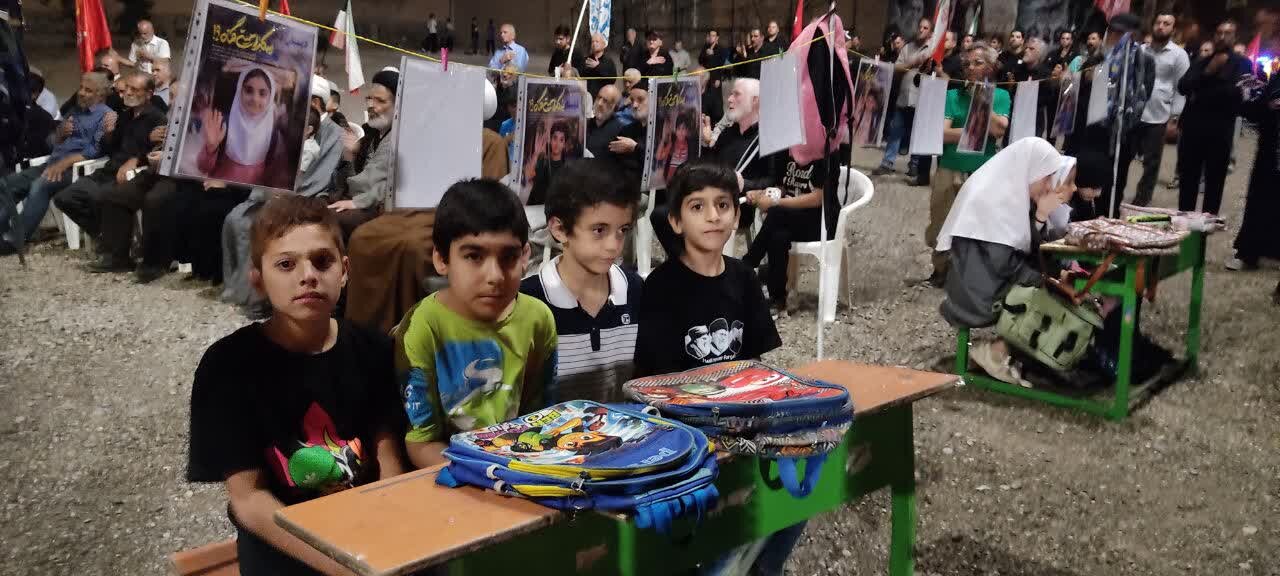 برپایی نمایشگاه تصاویر شهدای دانشآموز مدرسه میناب در حاشیه «موج ۱۴۹» در نطنز