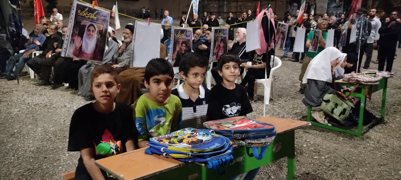 برپایی نمایشگاه تصاویر شهدای دانش‌آموز مدرسه میناب در حاشیه «موج ۱۴۹» در نطنز