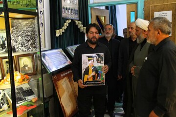 برپایی نمایشگاه تصاویر شهدای دانش‌آموز مدرسه میناب در حاشیه «موج ۱۴۹» در نطنز
