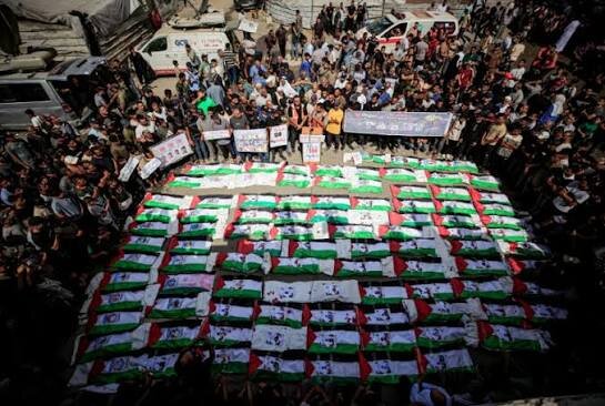 Mass funeral held in Gaza for 100 victims pulled from rubble