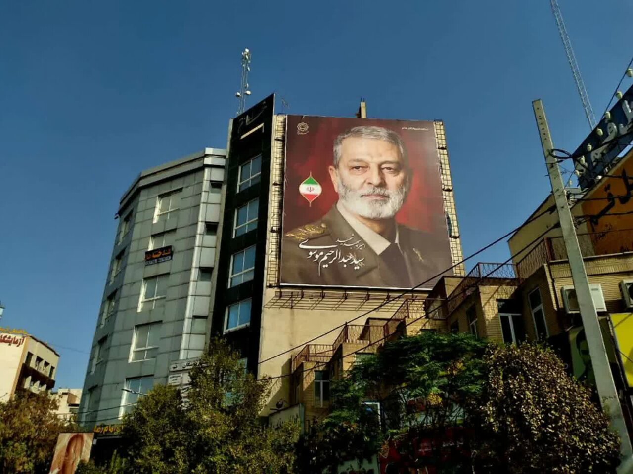 دیوارنگاره شهید سپهبد موسوی در قم رونمایی شد