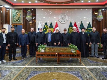 Imam Ali Holy Shrine Receives Encyclopedia Documenting Al-Qaeda and ISIS Terrorist Crimes in Iraq
